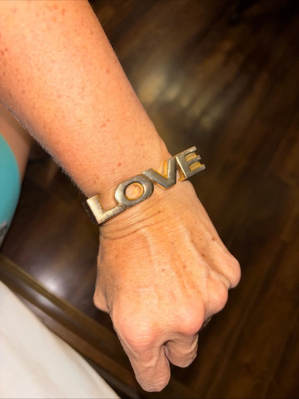 Gold Toned Brass “Love” Bangle Bracelet